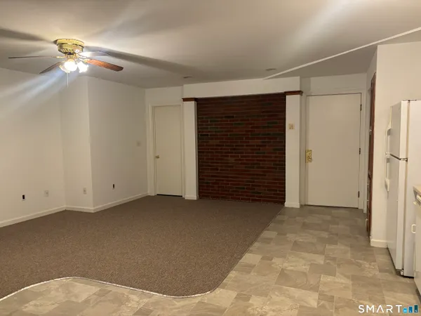 a view of a room with an empty space