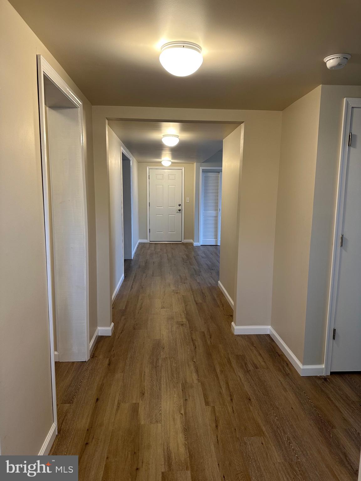 122 East Ridge Road, Unit A4 Marcus Hook, PA 19061 - Photo 9 of 11 a view of hallway with wooden floor