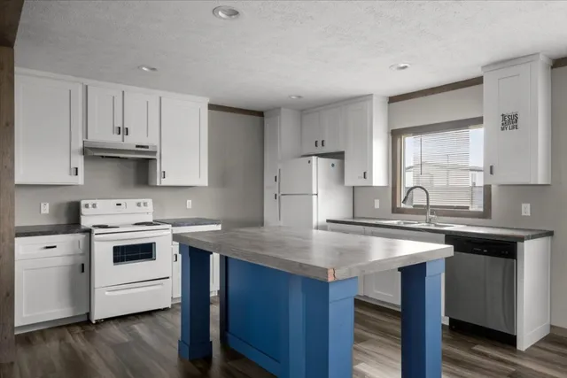 a dining room with furniture a chandelier and window