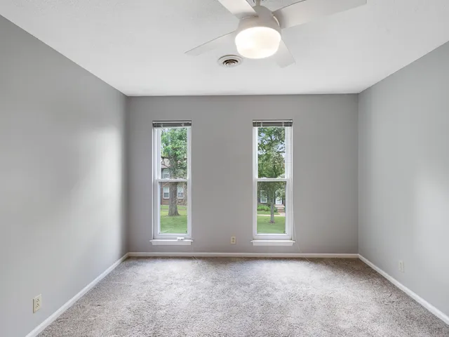 a view of a room with rack on the wall