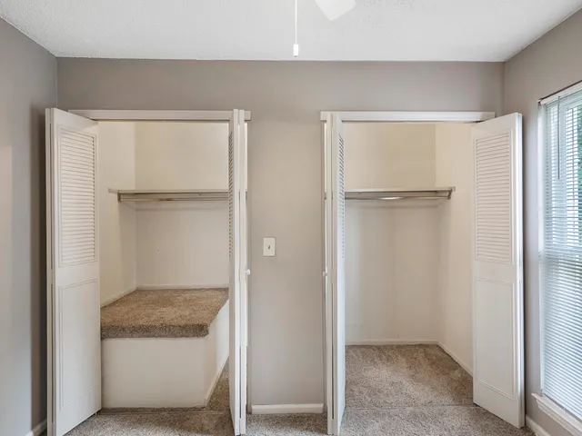 a front view of a house with parking