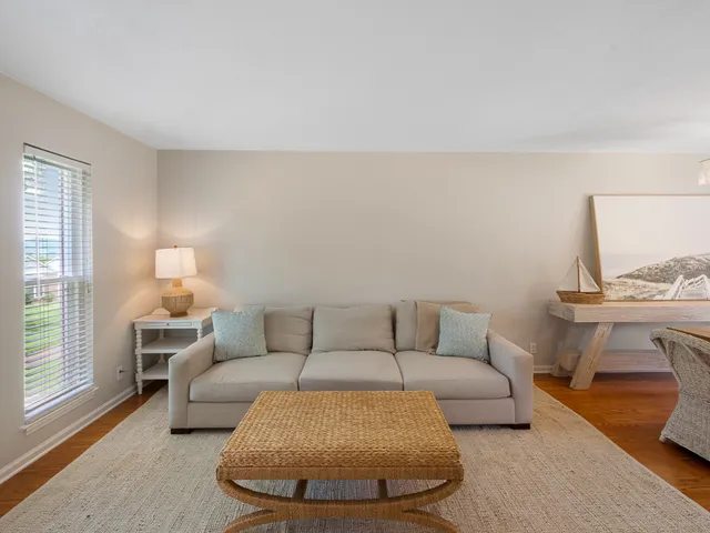 a living room with furniture and a couch