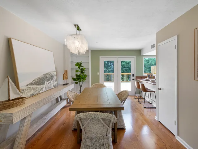 a view of a dining room with furniture