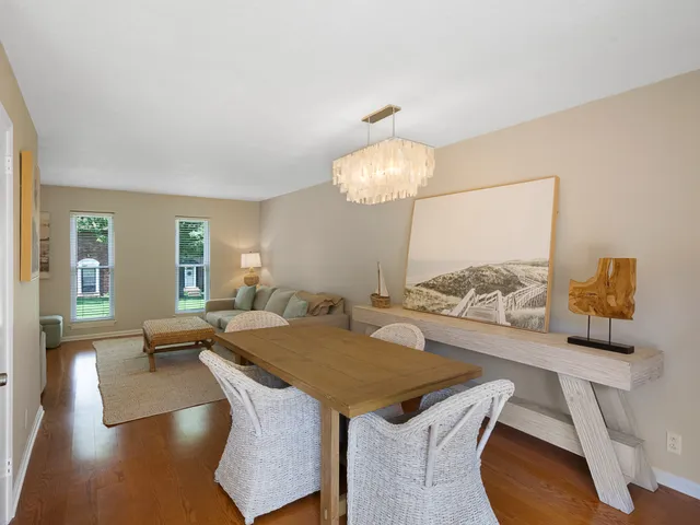 a kitchen with a stove a refrigerator and a stove top oven