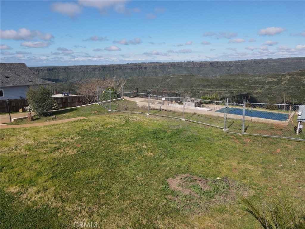 183 Valley Ridge Drive Paradise, CA 95969 - Photo 15 of 41 a view of a swimming pool with an ocean view