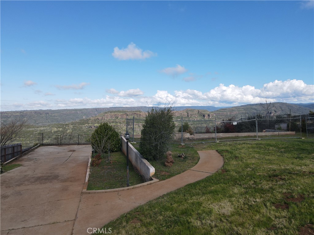 183 Valley Ridge Drive Paradise, CA 95969 - Photo 28 of 41 a view of a lake with a mountain in the background