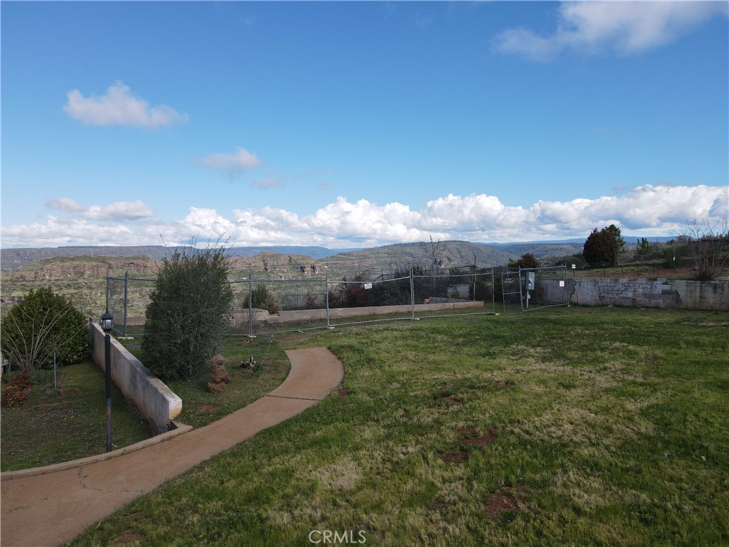 183 Valley Ridge Drive Paradise, CA 95969 - Photo 29 of 41 a view of a lake with a mountain in the background