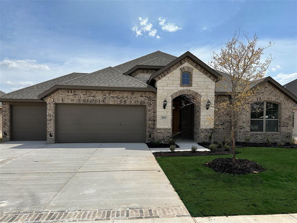 4034 Alpine Street Midlothian, TX 76065 - Photo 1 of 1 a front view of a house with garden
