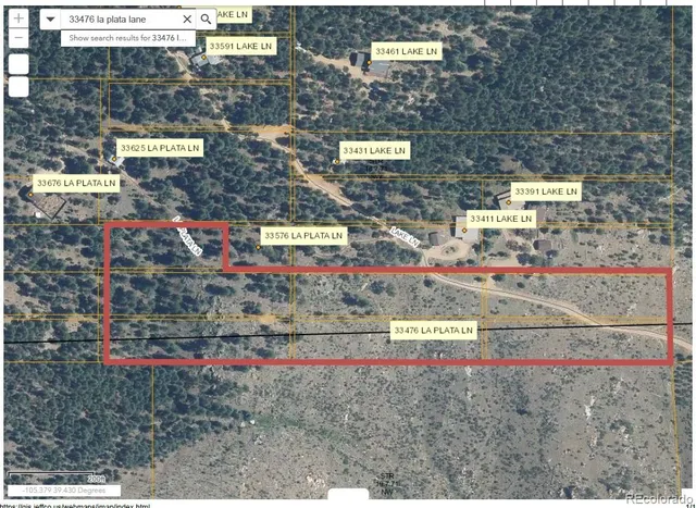 a view of parking and sign board