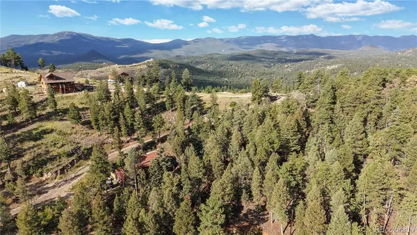 a view of a city with mountain