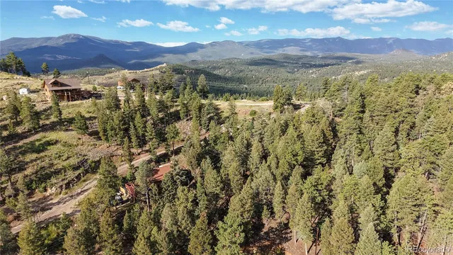 a view of a city with mountain
