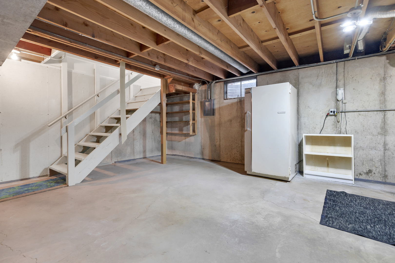 6971 Hanover Street Hanover Park, IL 60133 - Photo 13 of 20 a view of an empty room with stairs
