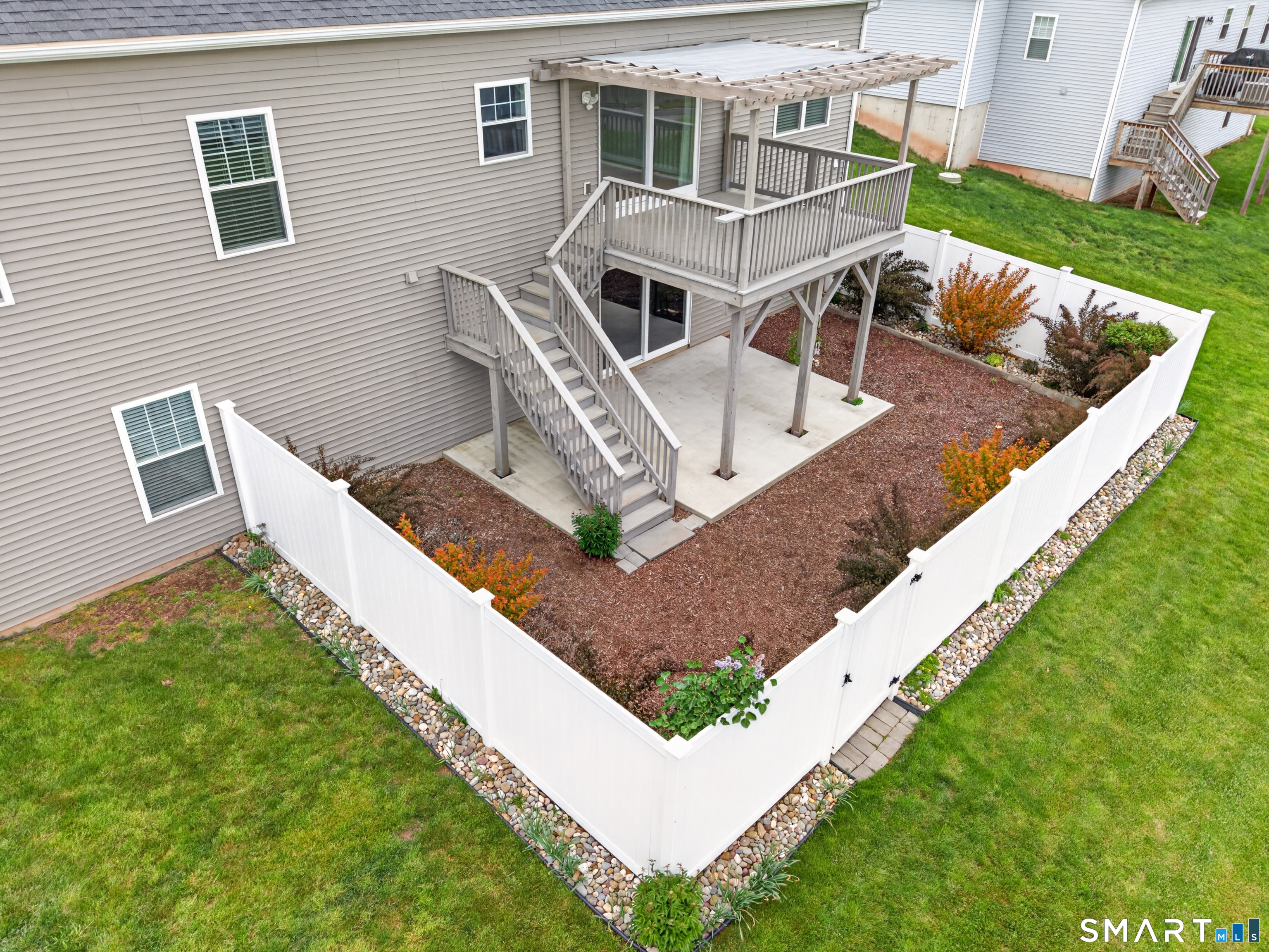 650 Ridgewood Road Middletown, CT 06457 - Photo 34 of 40 a view of a house with backyard and deck