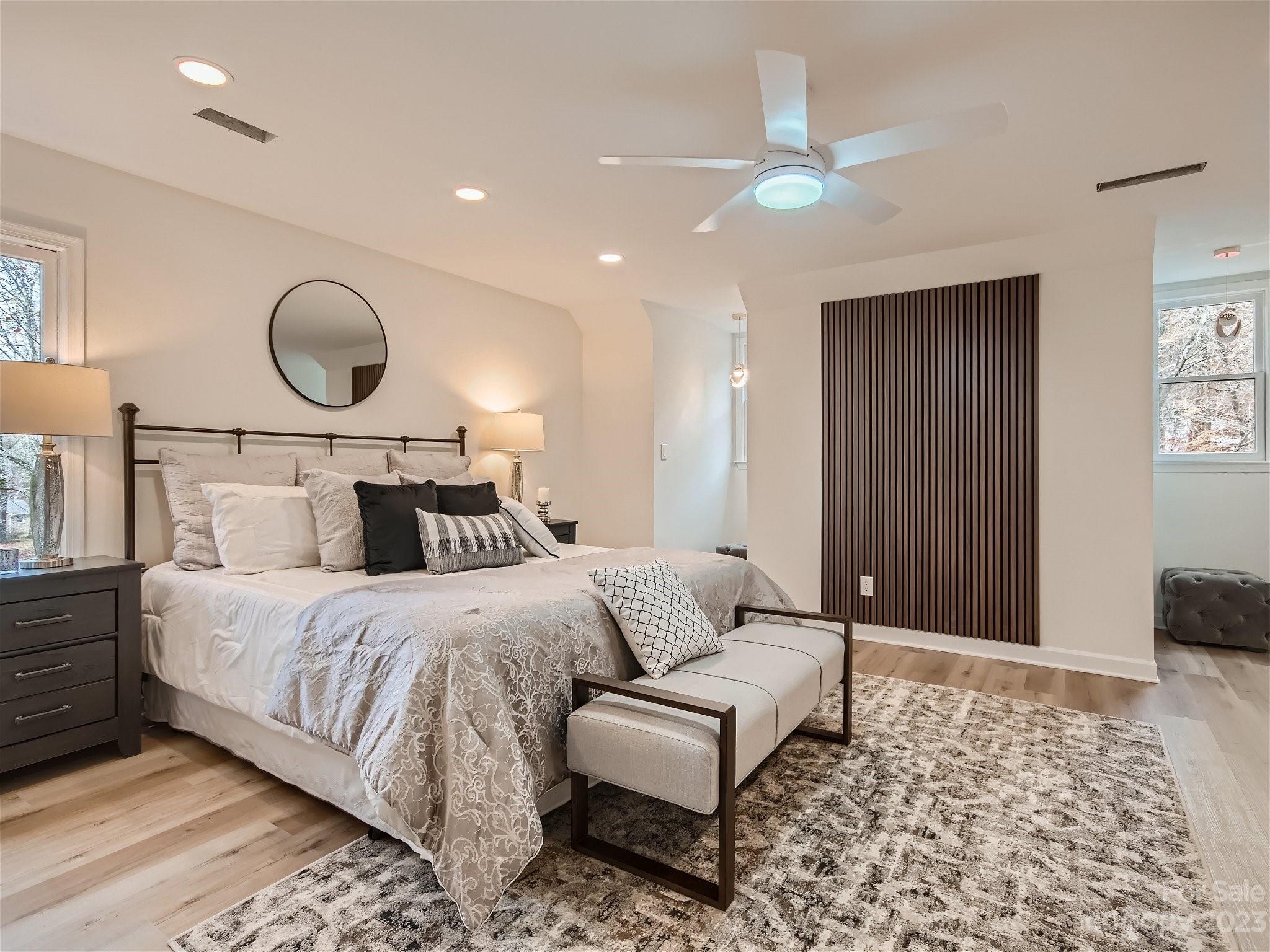 7201 Leaves Lane Charlotte, NC 28213 - Photo 19 of 29 a bedroom with bed and a couch