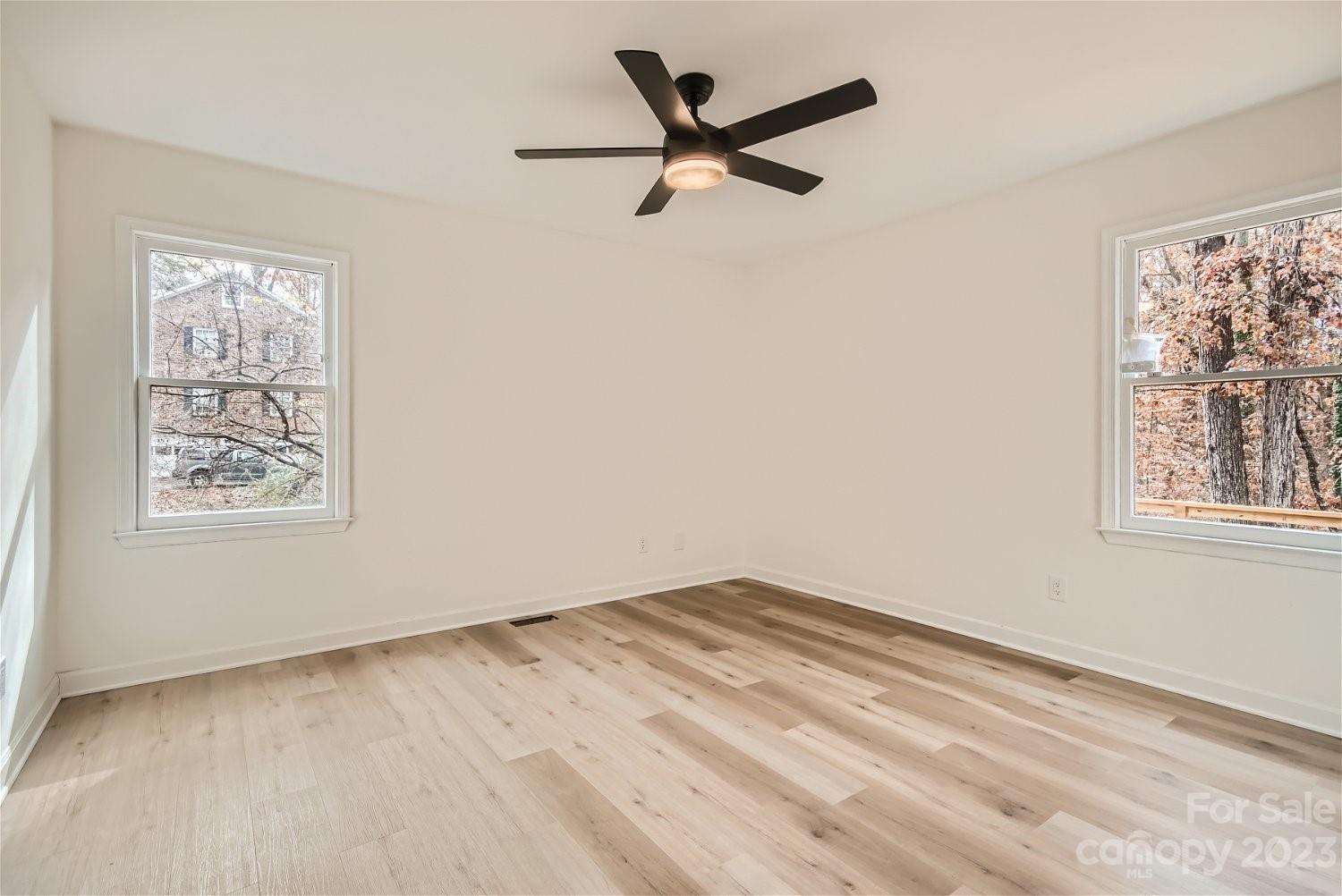 7201 Leaves Lane Charlotte, NC 28213 - Photo 23 of 29 a view of a room with window and ceiling fan