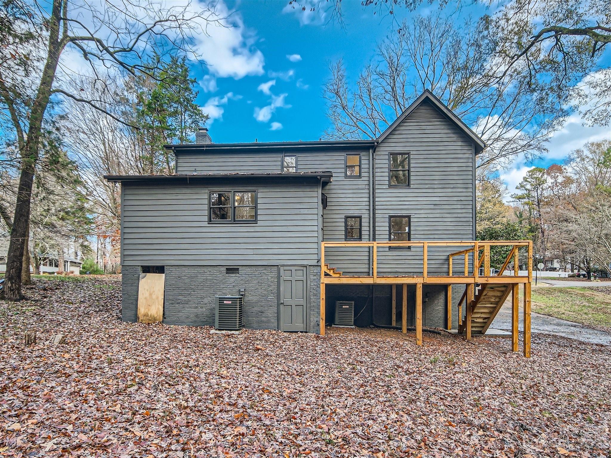 7201 Leaves Lane Charlotte, NC 28213 - Photo 25 of 29 a backyard of a house with table and chairs