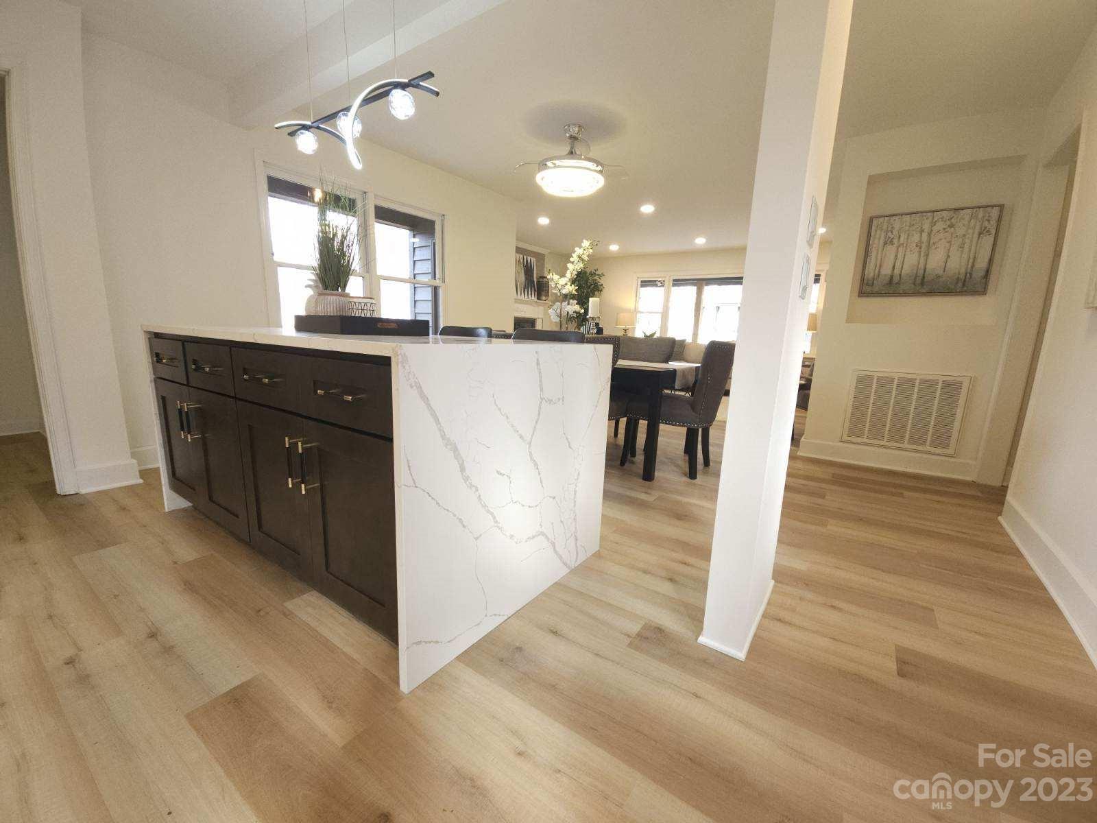 7201 Leaves Lane Charlotte, NC 28213 - Photo 7 of 29 a view of a kitchen and dining room