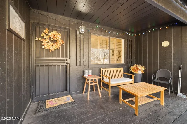 a bathroom with a shower and a sink