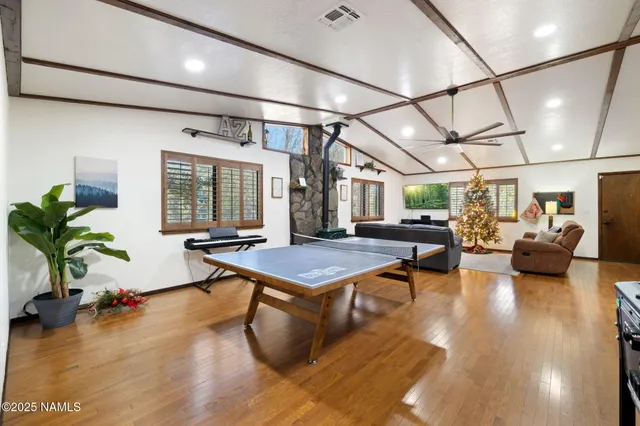 a view of a bathroom with a walk in closet and bathroom