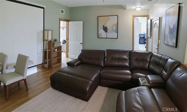 a living room with furniture and a couch