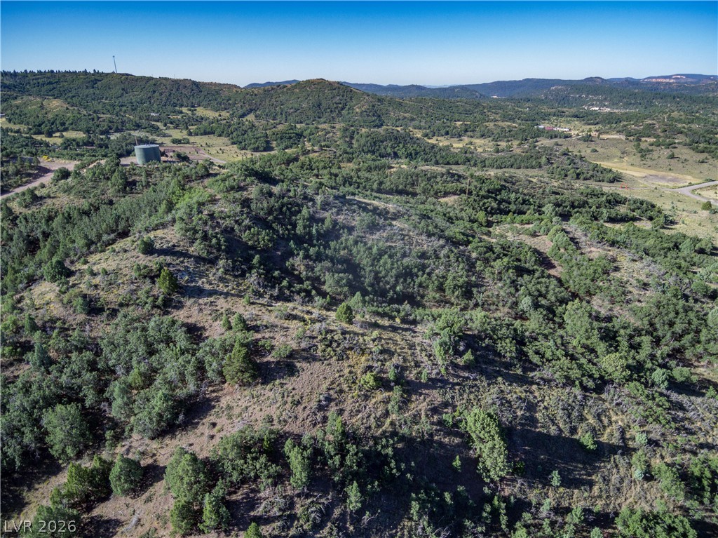 495 West Lutherwood Road Alton, UT 84710 - Photo 7 of 35 A sprawling canvas of verdant hills offers a serene, elevated panorama for your future retreat.