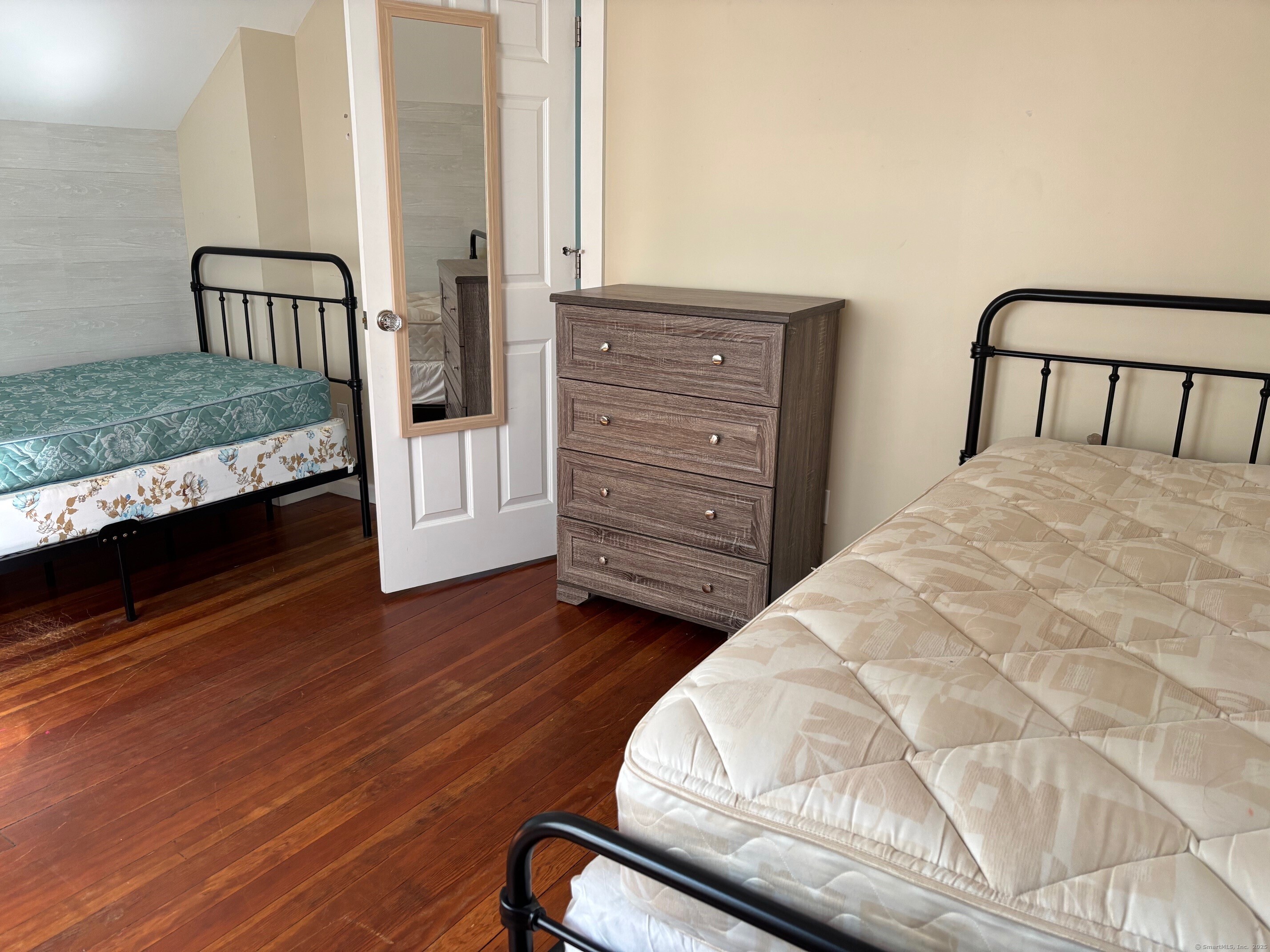 799 Rowland Road Fairfield, CT 06824 - Photo 11 of 15 a bedroom with a bed and a dresser