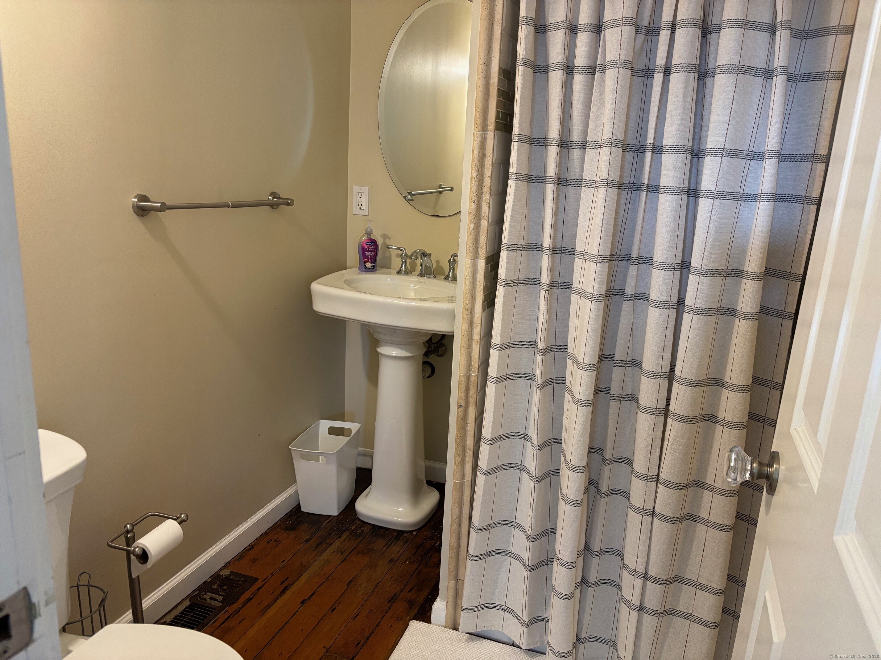 799 Rowland Road Fairfield, CT 06824 - Photo 9 of 15 a bathroom with a sink toilet and shower