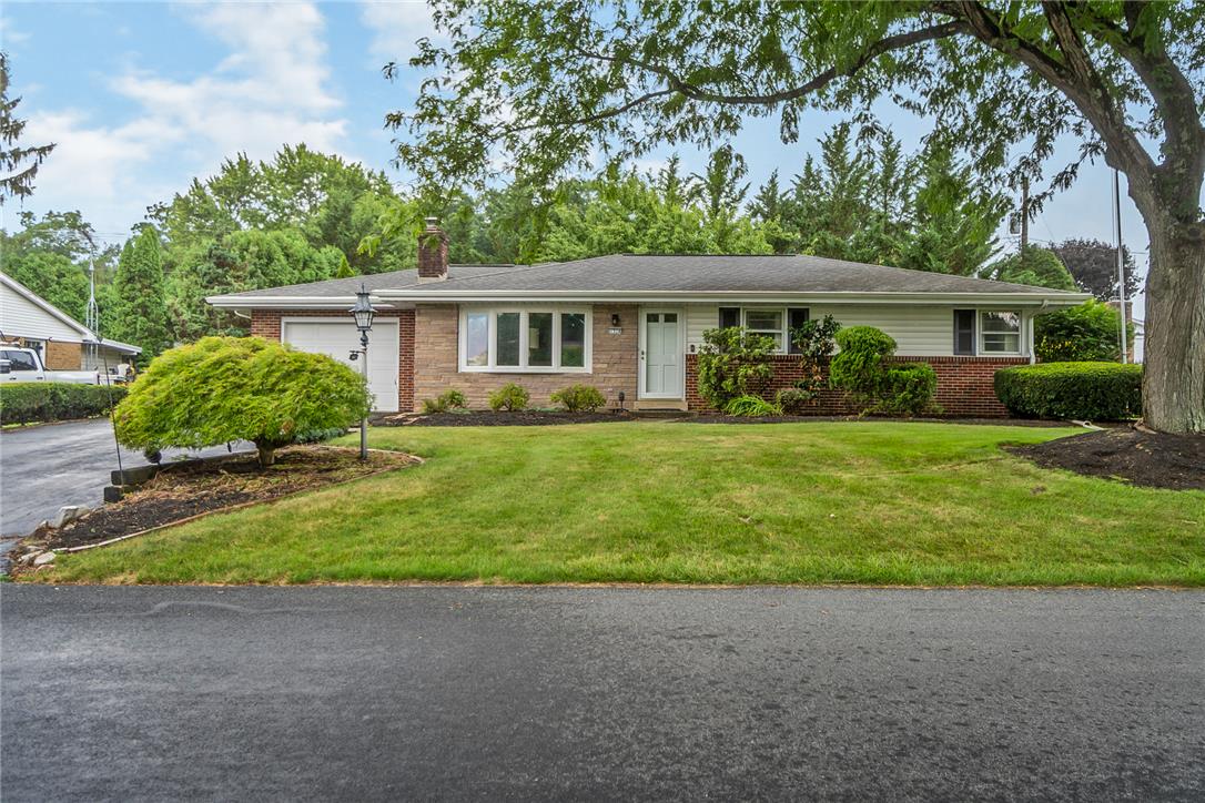 1328 Russett Road Allentown, PA 18104 - Photo 1 of 46 A classic ranch home showcasing a neat lawn and mature landscaping.