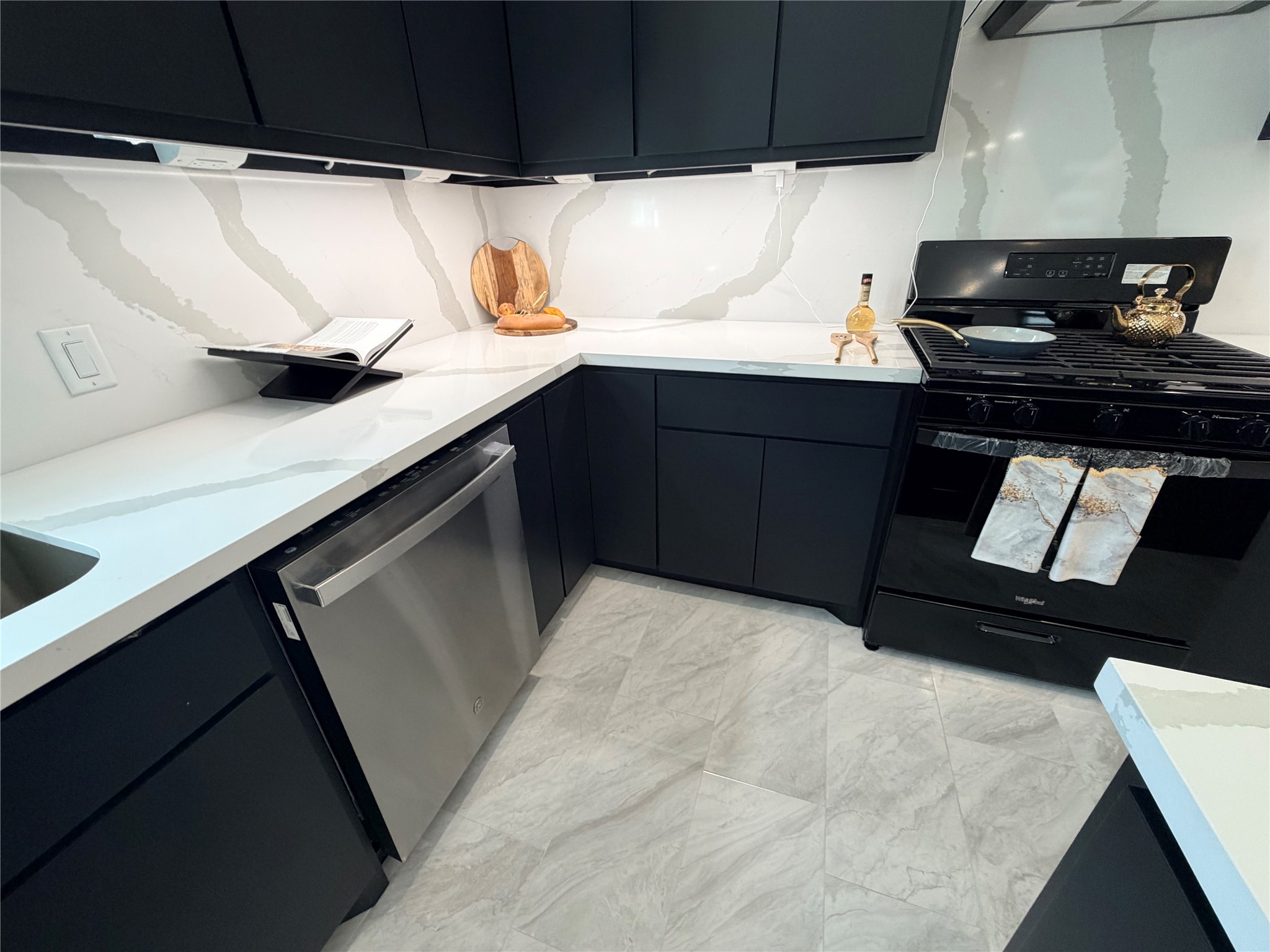 4501 Hirsch Road Houston, TX 77026 - Photo 23 of 30 a kitchen with a sink and cabinets