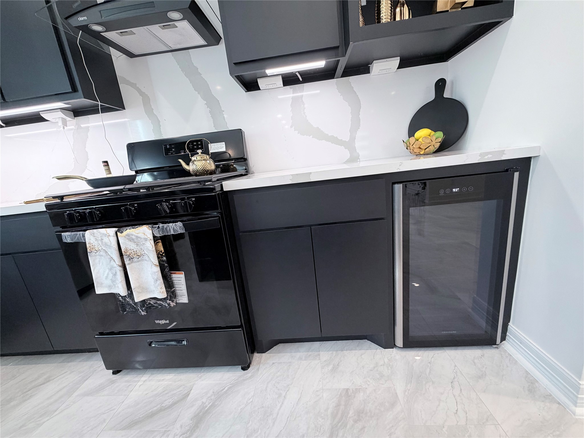 4501 Hirsch Road Houston, TX 77026 - Photo 27 of 30 a kitchen with a stove and a cabinet