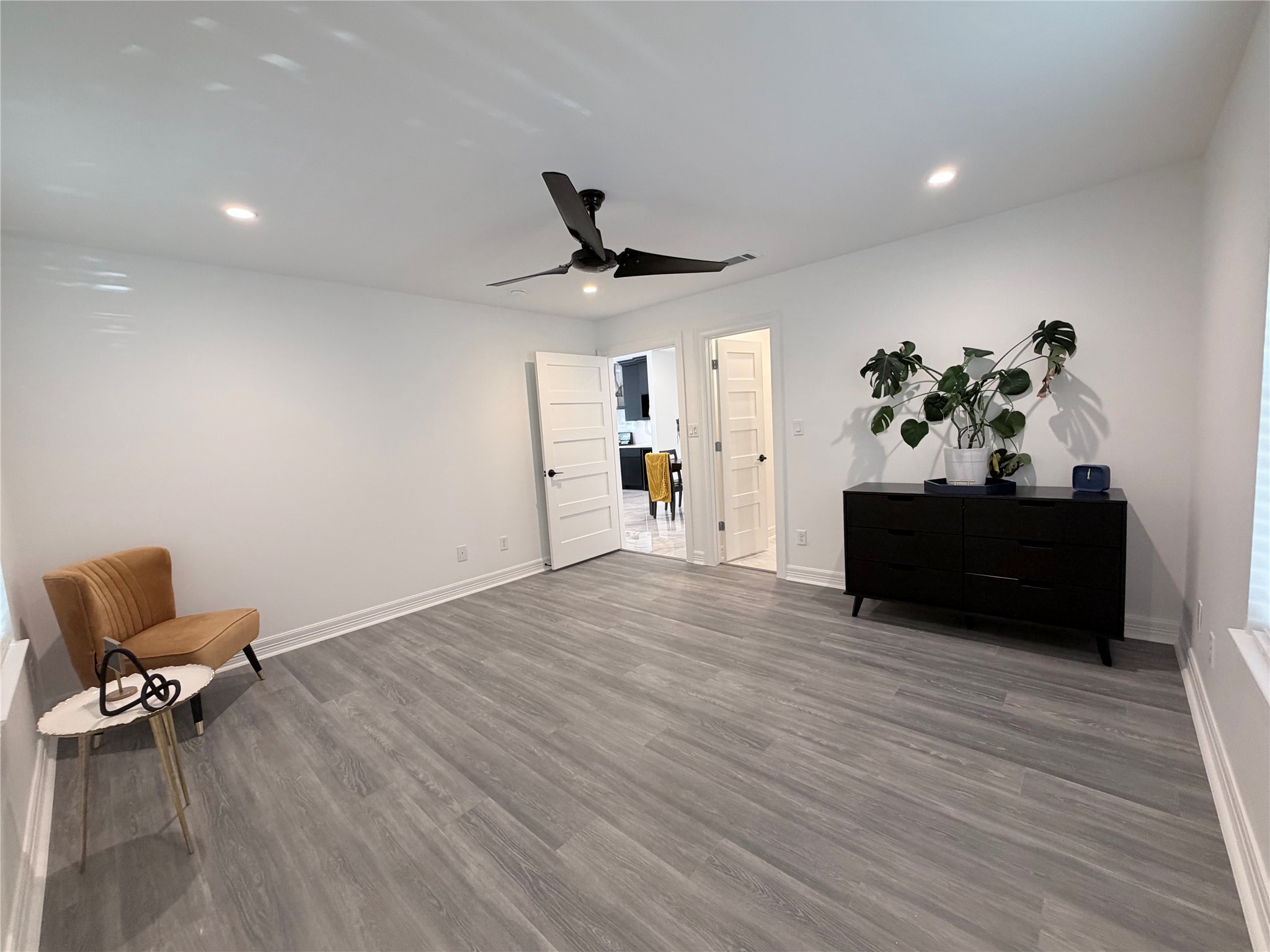 4501 Hirsch Road Houston, TX 77026 - Photo 4 of 30 a living room with furniture and a wooden floor
