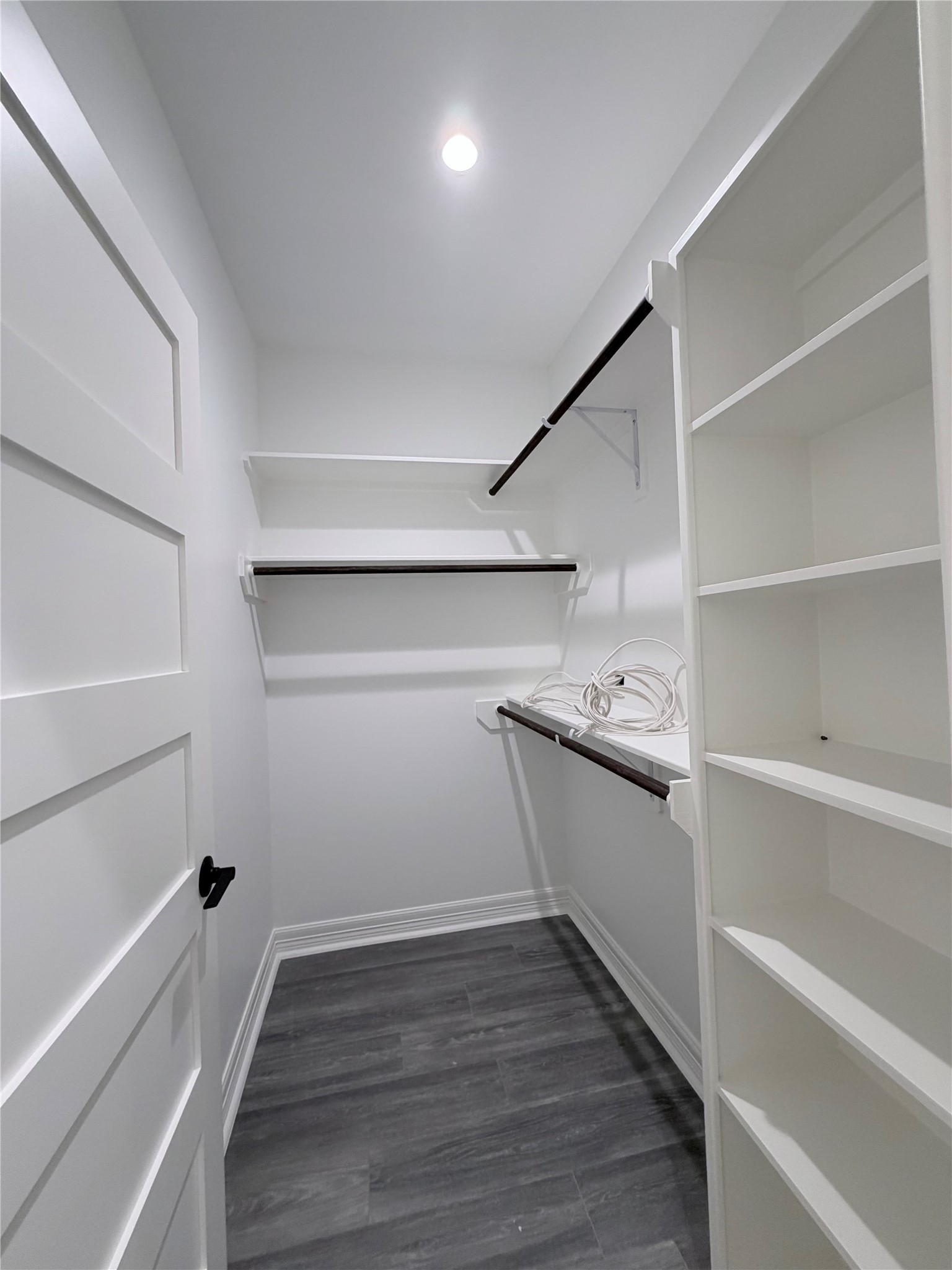 4501 Hirsch Road Houston, TX 77026 - Photo 9 of 30 a view of a kitchen with wooden floor and electronic appliances