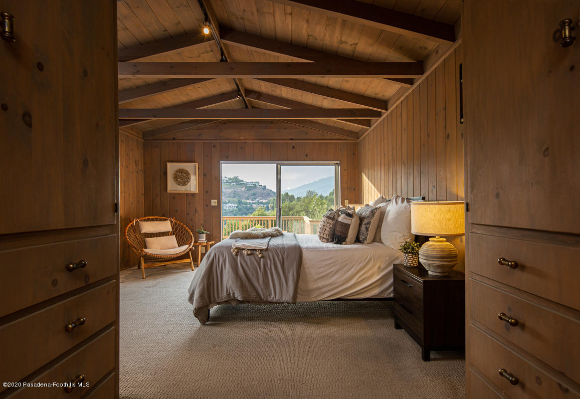 1839 North Arroyo Boulevard Pasadena, CA 91103 - Photo 13 of 36 a bedroom with a bed and a window