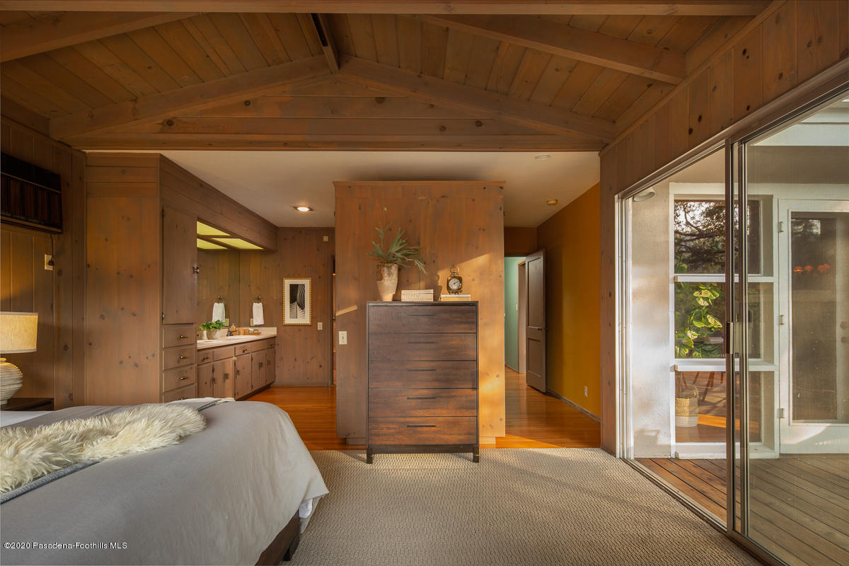 1839 North Arroyo Boulevard Pasadena, CA 91103 - Photo 17 of 36 a bed room with a bed and dresser