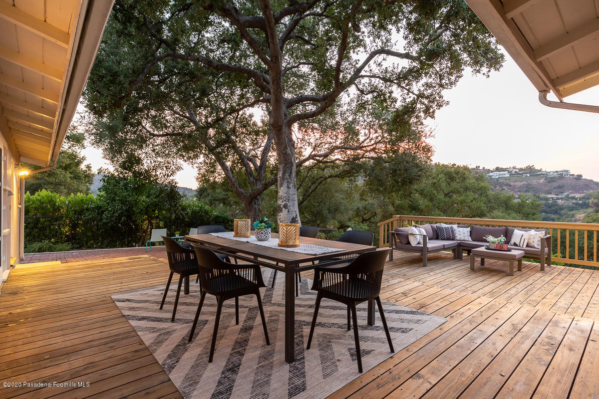 1839 North Arroyo Boulevard Pasadena, CA 91103 - Photo 25 of 36 a view of backyard with seating space and trees