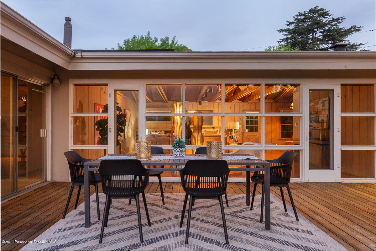 1839 North Arroyo Boulevard Pasadena, CA 91103 - Photo 27 of 36 a view of a dining room with furniture and wooden floor