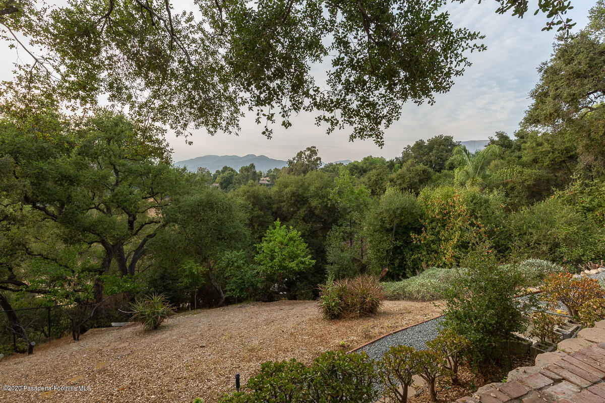 1839 North Arroyo Boulevard Pasadena, CA 91103 - Photo 29 of 36 a view of a field with trees in the background