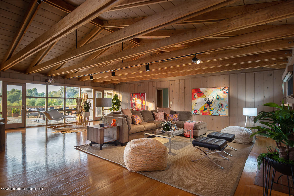 1839 North Arroyo Boulevard Pasadena, CA 91103 - Photo 4 of 36 a living room with furniture and a large window