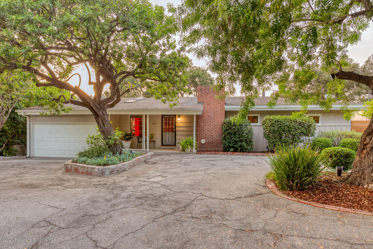1839 North Arroyo Boulevard Pasadena, CA 91103 - Photo 35 of 36 a front view of a house with garden