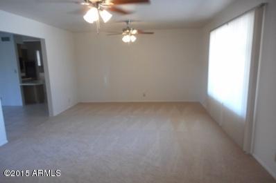 6013 East Decatur Street Mesa, AZ 85205 - Photo 5 of 22 living room with lights on