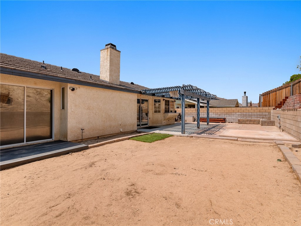 13901 Hidden Valley Road Victorville, CA 92395 - Photo 28 of 31 a view of a house with snow on the road
