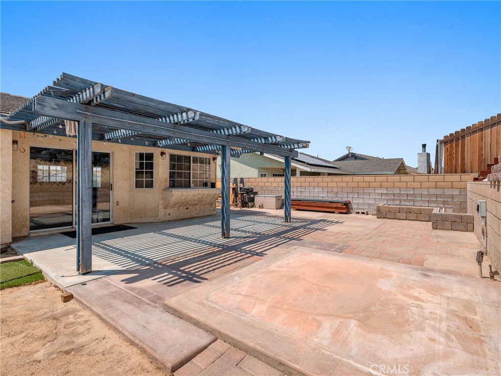 13901 Hidden Valley Road Victorville, CA 92395 - Photo 29 of 31 a view of a house with backyard