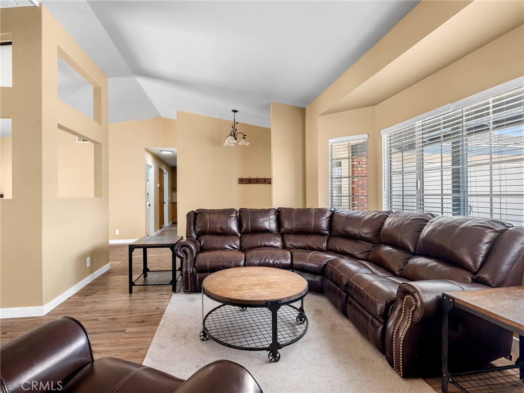 13901 Hidden Valley Road Victorville, CA 92395 - Photo 6 of 31 a living room with furniture and a large window