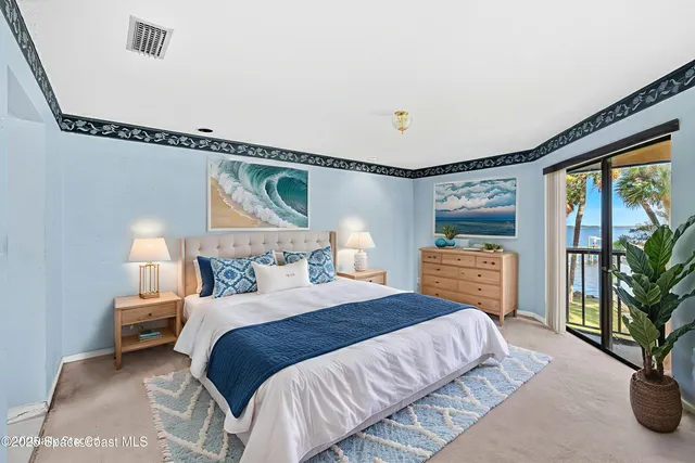 a view of a room with an entryway