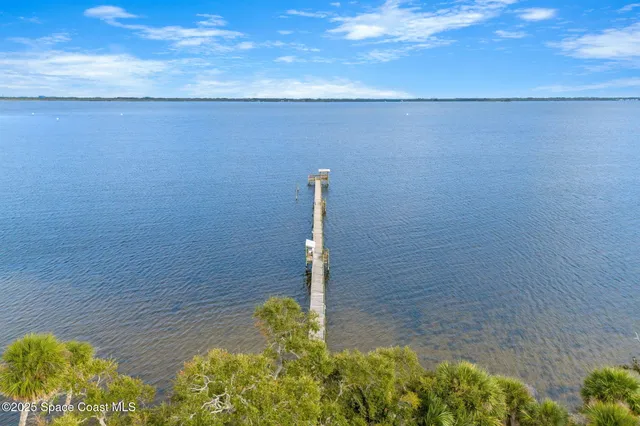 a view of a lake with a big yard