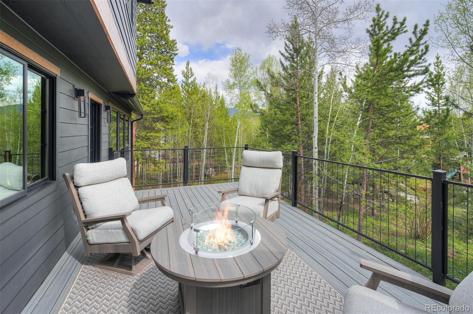 306 Golden Eagle Road Silverthorne, CO 80498 - Photo 14 of 43 a view of a chairs and table in patio