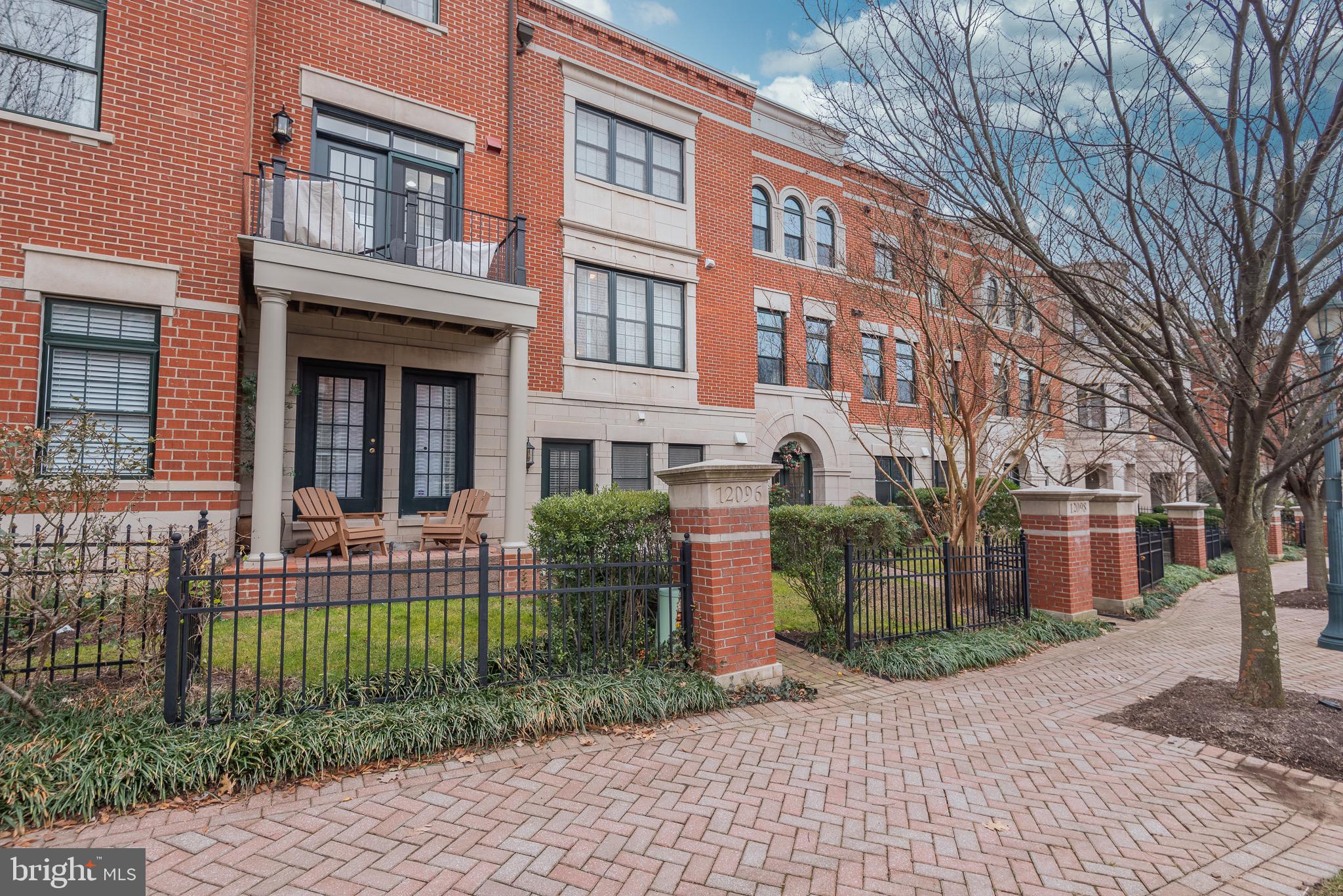 12096 Kinsley Place Reston, VA 20190 - Photo 3 of 28 Back walkway with gated yard