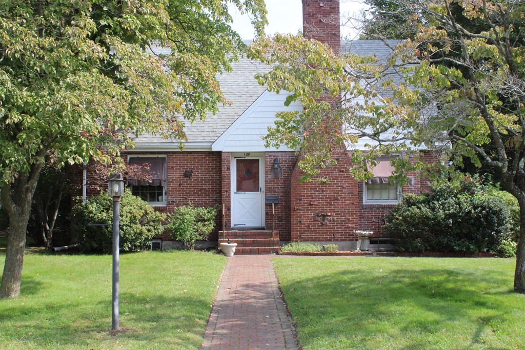 128 Webster Street Needham, MA 02494 - Photo 2 of 16 a view of a house with a yard and plants