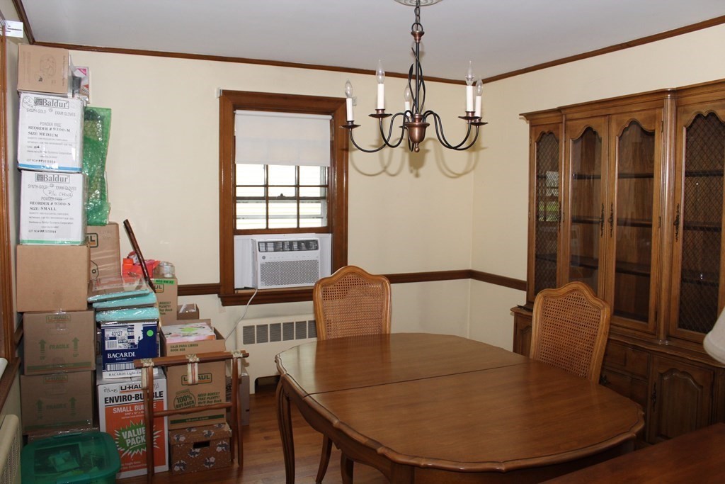 128 Webster Street Needham, MA 02494 - Photo 7 of 16 a view of a dining room with furniture window and outside view