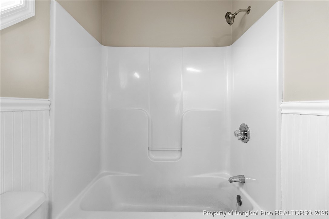 122 Spring Valley Drive Raeford, NC 28376 - Photo 19 of 36 a bathroom with a bathtub